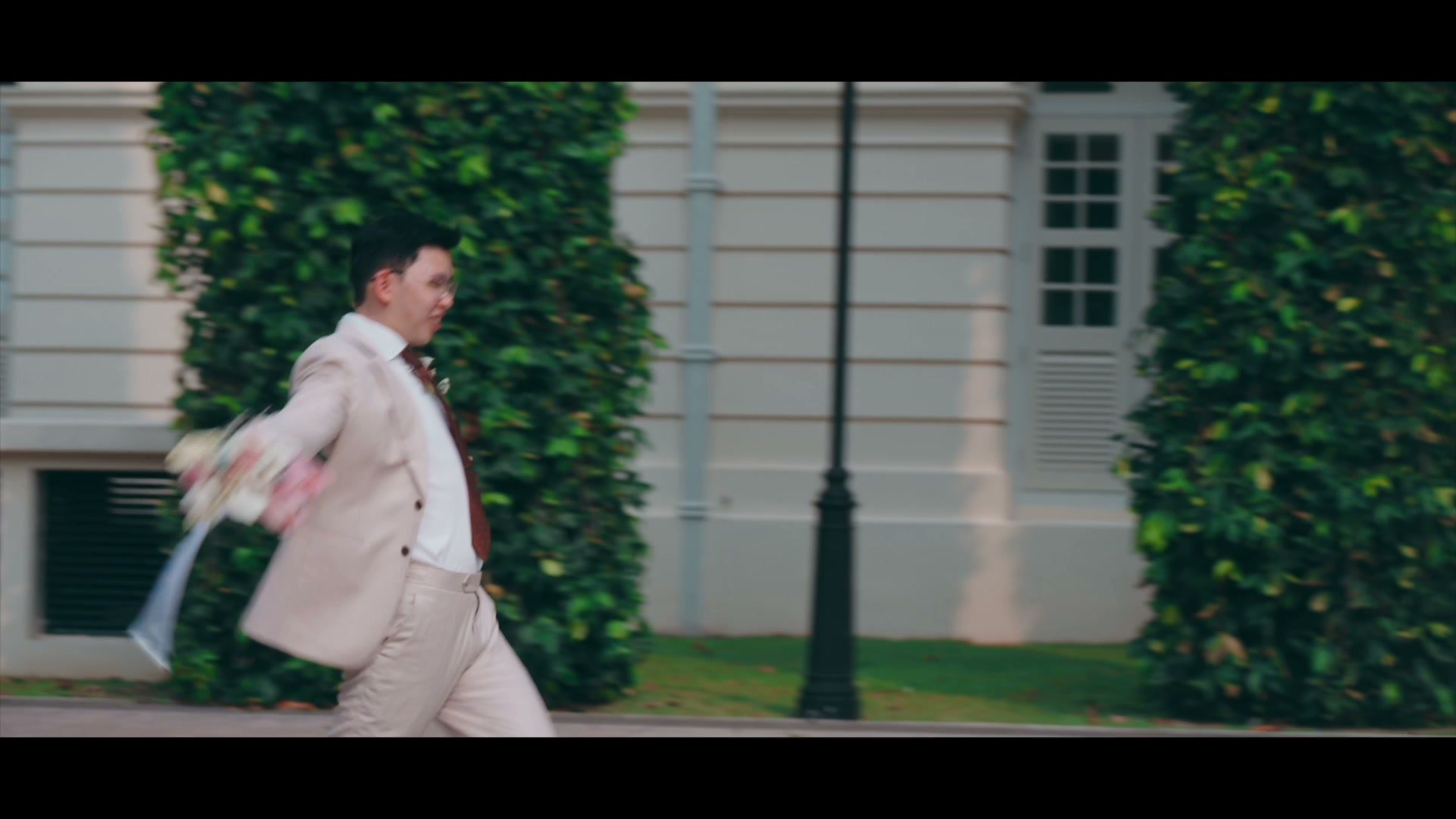 A bride walking toward her wedding ceremony